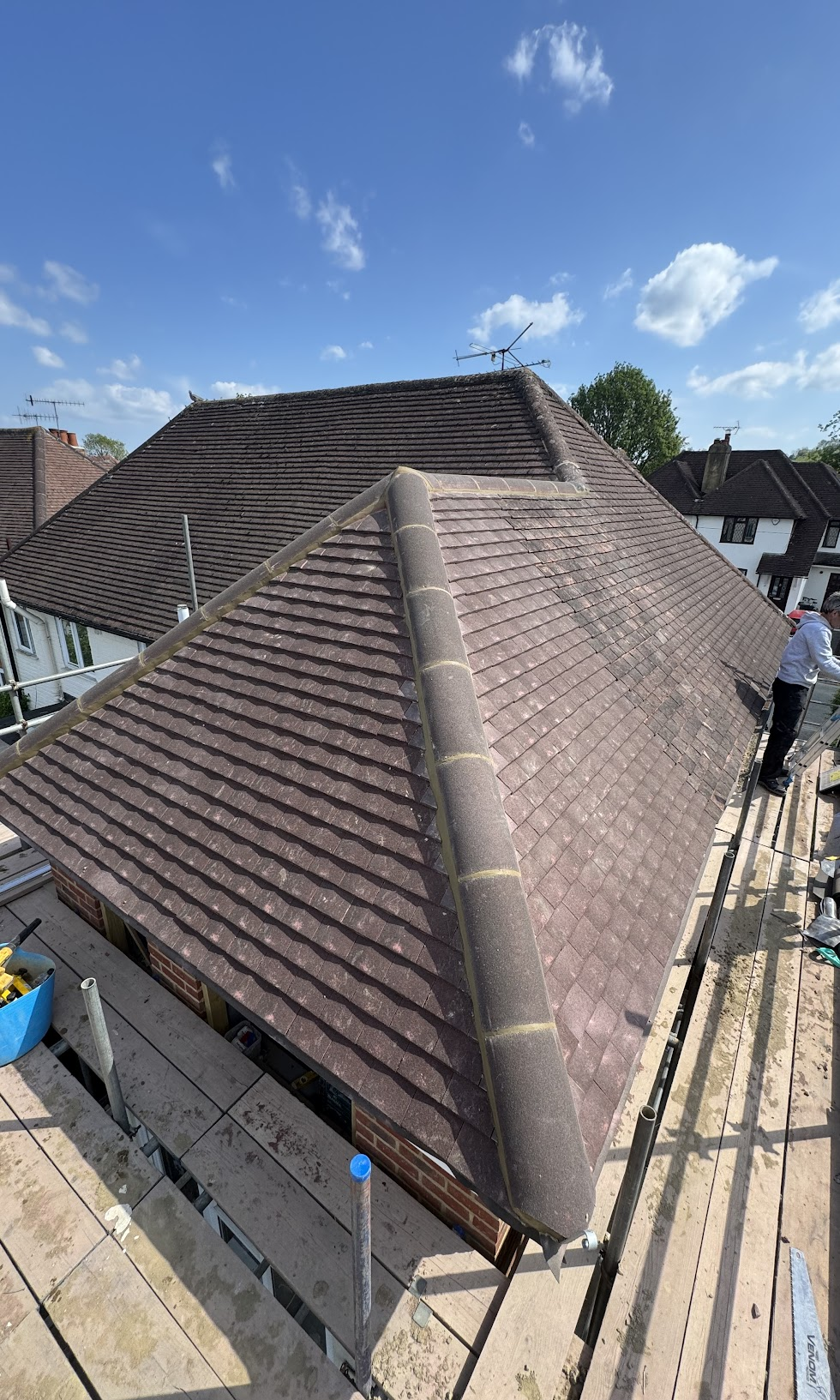 Example flat roofing work near Bletchley (MK3) — close-up roof detail: interlocking tiles bedded onto treated battens